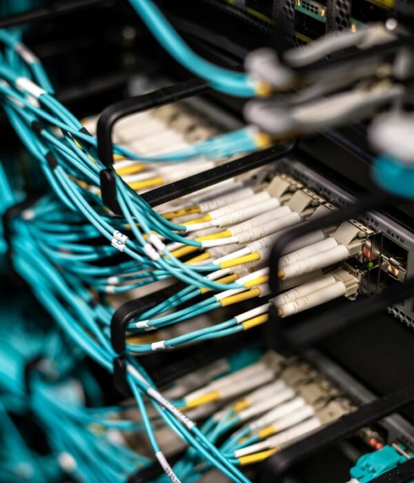 pexels-photo-5073493-5073493-1 Numerous wires and cables mounted into server patch panel in modern data center